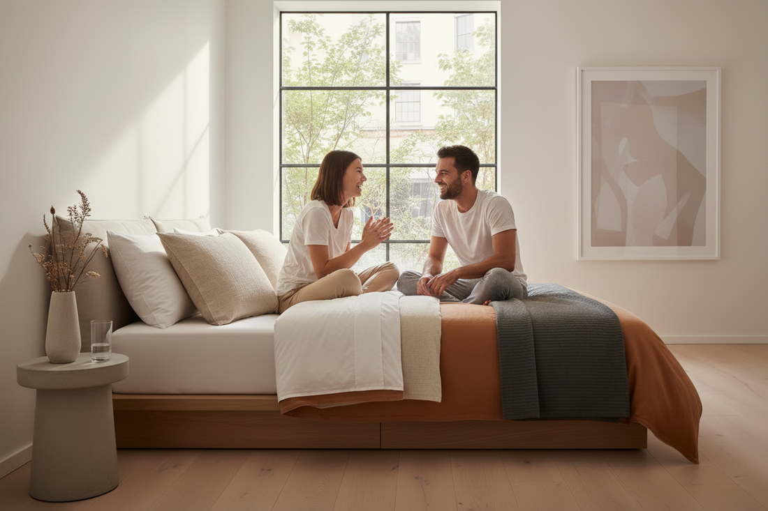 Woman relaxing in a beautifully styled bedroom with Pellikanz bedding essentials