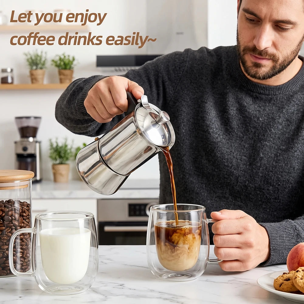 A person pouring coffee from a French press into a double-wall mug containing milk.