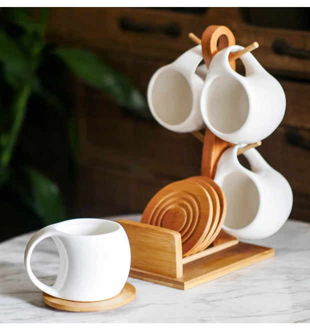 Set of Ceramic Cups and Saucers with Bamboo Tray – 4 to 6 Pieces, Elegant and Heat Resistant Design.