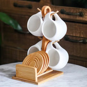 Set of Ceramic Cups and Saucers with Bamboo Tray – 4 to 6 Pieces, Elegant and Heat Resistant Design.