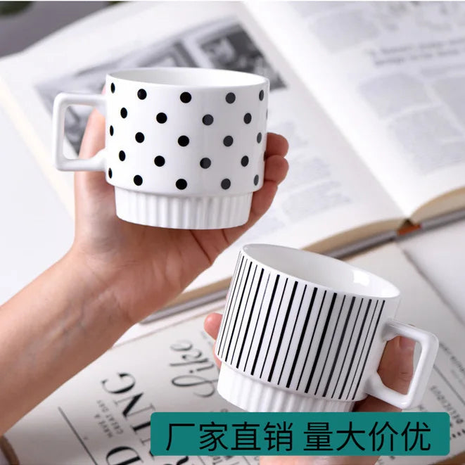 Nordic-style ceramic mug (1 unit), with various graphic prints. Stackable.