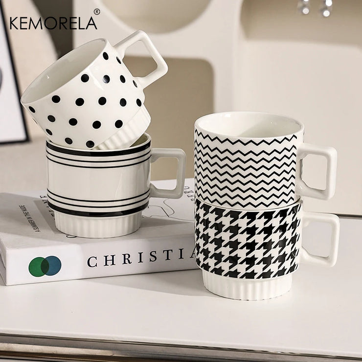 Nordic-style ceramic mug (1 unit), with various graphic prints. Stackable.