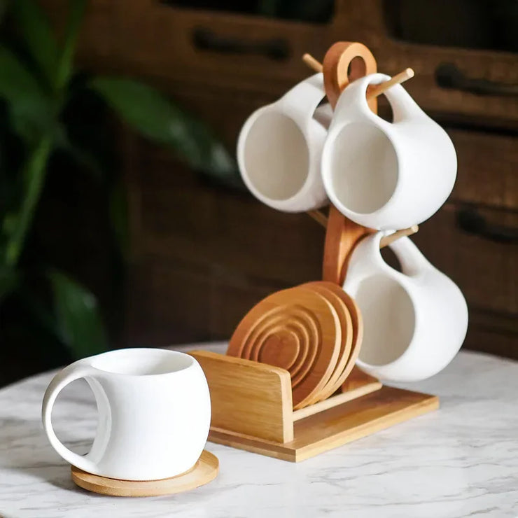 Set of Ceramic Cups and Saucers with Bamboo Tray – 4 to 6 Pieces, Elegant and Heat Resistant Design.